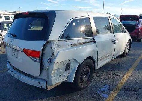 2015 Honda Odyssey Lx z USA, uszkodzony, nr VIN 5FNRL5H29FB053677